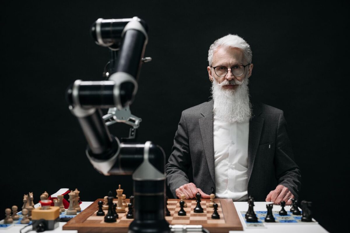 Respublicanova Elderly man in suit competes against a robotic arm in an intense chess game.